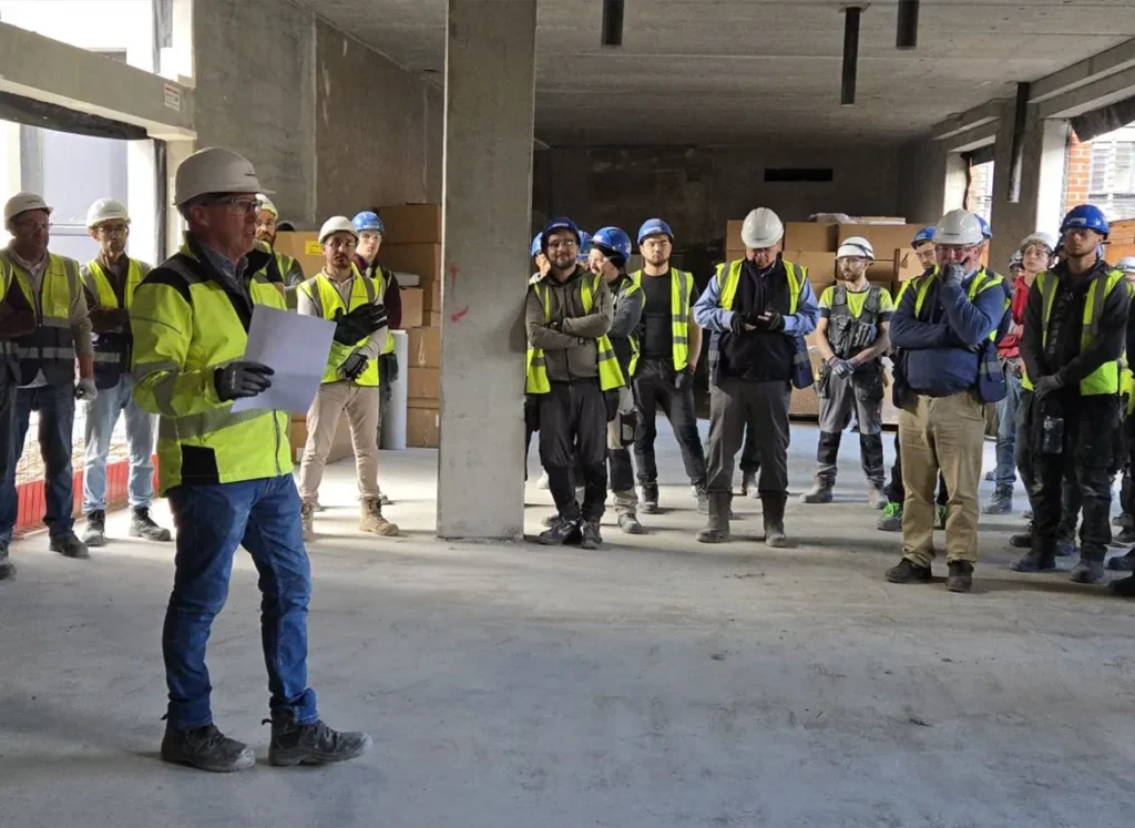 Health and safety talk being given to construction workers